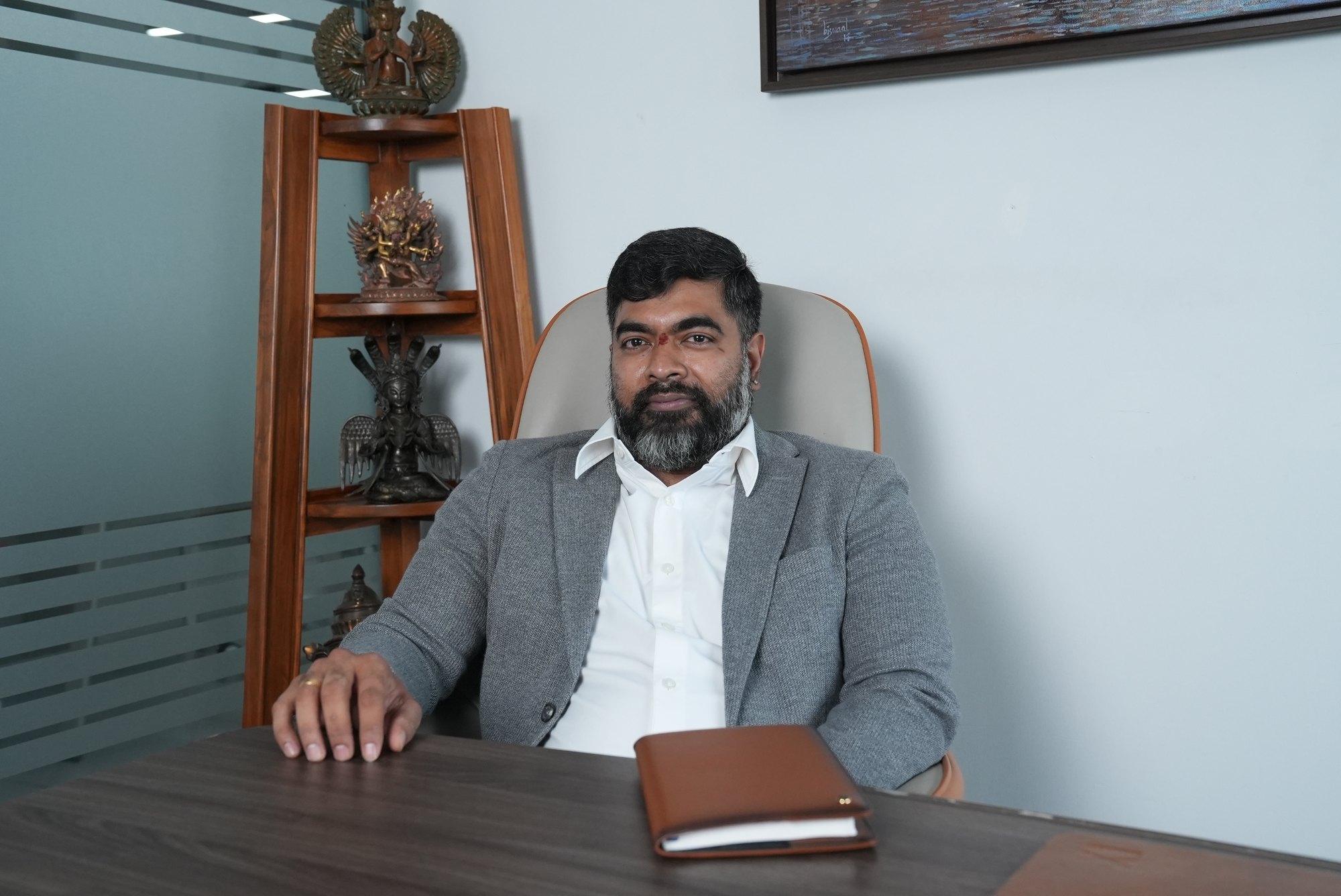 Ravi Daparthi at his desk at LawVyn's Hyderabad office